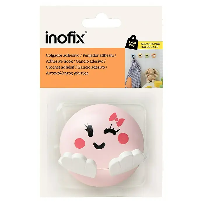 Inofix Colgador adhesivo infantil - Plástico, Rosa - Embalaje de un colgador adhesivo Inofix en rosa con una cara simpática, ideal para colgar objetos ligeros.