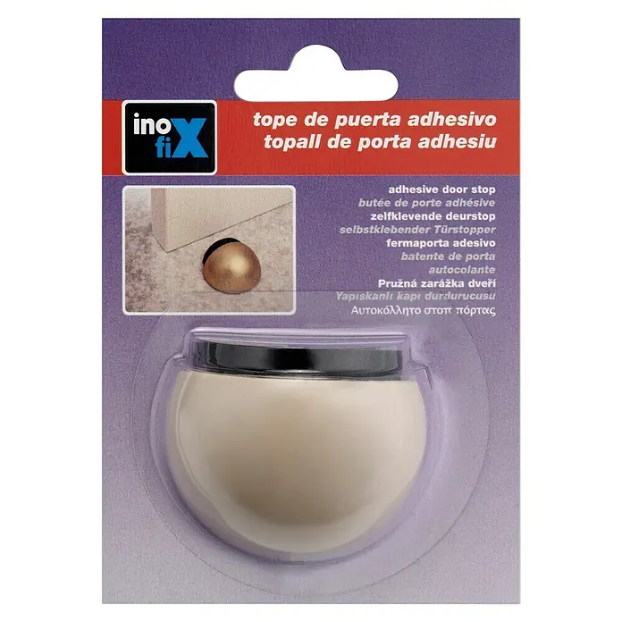 Inofix Tope de puerta 2029 - Plástico, Beige - Tope adhesivo de puerta Inofix, empaquetado en una tarjeta púrpura con traducciones a varios idiomas.
