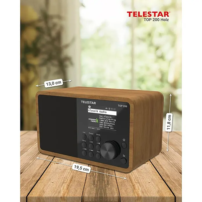 Telestar Internetradio Top 200 - L x B x H: 13 x 19,1 x 11,8 cm, Braun - Produktansicht des Telestar TOP 200 Holz Radios mit seinen Abmessungen auf einem Holztisch vor einem Fenster.