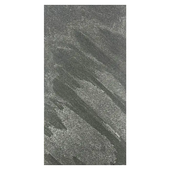 Jangal Wandpaneel Modular Wall Stone - Grey Slate, 1.040 x 520 x 6 mm - Das Bild zeigt eine Nahaufnahme einer dunklen, texturierten Oberfläche mit diagonalen Mustern, die wie polierter Stein wirkt.