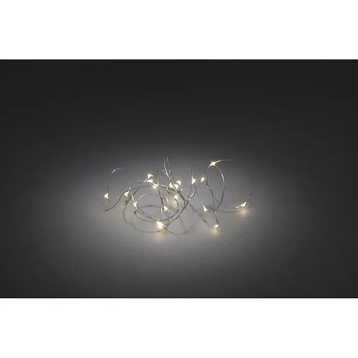 Konstsmide LED-Lichterkette - Innen, Lichtfarbe: Warmweiß, Anzahl Leuchtmittel: 40 Stk., Batteriebetrieben - Silberdraht-Lichterkette mit warmweißen LEDs, ideal für stimmungsvolle Dekorationen im Innenbereich, die eine gemütliche Atmosphäre schaffen.