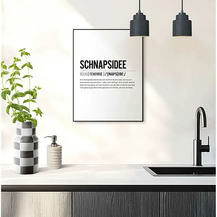 Reinders Bild Slim Frame Black - Schnapsidee, B x H: 30 x 40 cm - Schwarzer gerahmter "Schnapsidee"-Kunstdruck mit der Definition des deutschen Wortes "Schnapsidee", umgeben von minimalistischem Dekor.