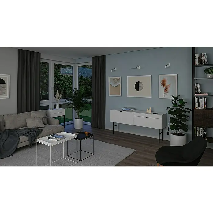 Paulmann LED-Bilderleuchte Set Adelia - 9 W, L x B x H: 28,5 x 8,5 x 8,5 cm, Alu gebürstet, Warmweiß - Helles Wohnzimmer mit modernem Sofa, Couchtisch und Bücherregal. Die Dekoration ist stilvoll und einladend.