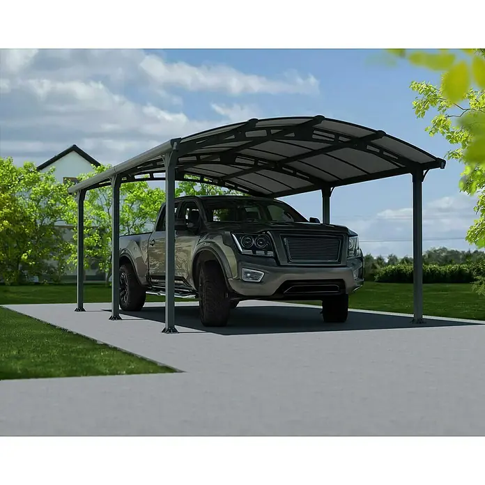 Palram – Canopia Carport Arcadia - Medidas ext. (An x Pr): 3,59 x 3,59 m, Carport doble, Gris - Una moderna cochera con un camión estacionado debajo, que ofrece protección contra los elementos mientras exhibe el vehículo.