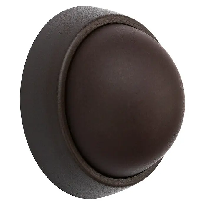 Inofix Tope de puerta 2450 - Plástico, Marrón - Primer plano de un tope de puerta redondo marrón con un borde ligeramente elevado, ideal para proteger paredes y muebles.