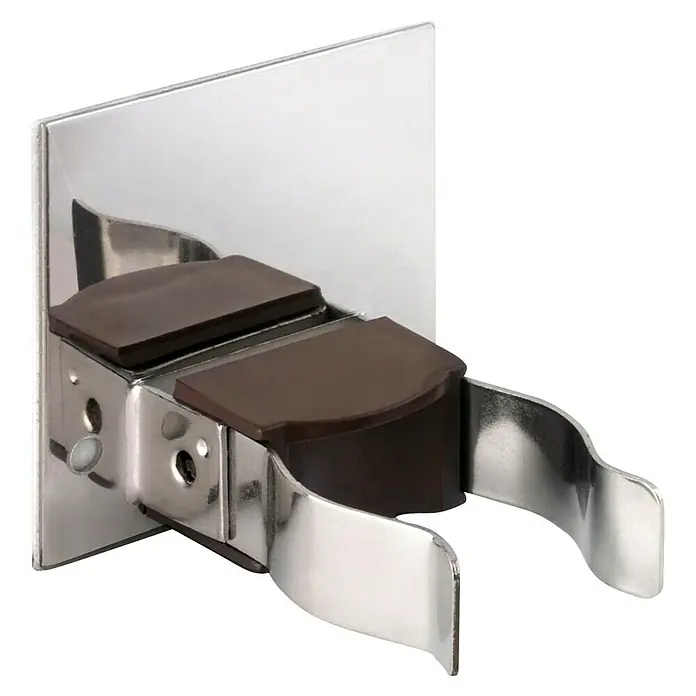 Inofix Tope de puerta 2026-4 - Metal, Marrón - Primer plano de un soporte de pared cromado para un dispositivo médico con insertos de goma marrones.