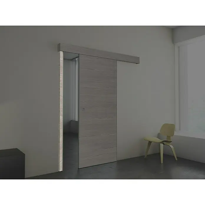 Estructura batiente Roble Finlandés - 67 x 2.140 mm, Roble oscuro - Elegante puerta corredera de madera en un interior moderno, que combina funcionalidad y estilo. Su diseño discreto se integra perfectamente en el espacio.