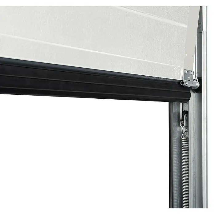 Solid Elements Garagentor Solid Pro Iso - 2.500 x 2.125 mm, Außen: Reinweiß, Innen: Grauweiß - Detailaufnahme einer Garagentür mit Gummidichtung und Federmechanismus, die für Abdichtung und reibungslosen Betrieb sorgen.