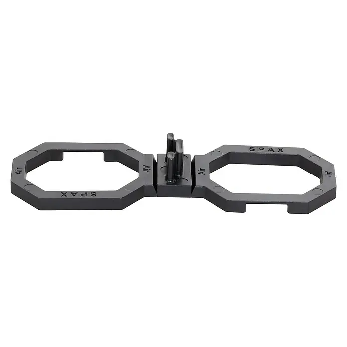 Spax Abstandhalter Air - 100 Stk., Stärke: 4,5 mm - Das Bild zeigt einen grauen SPAX Abstandhalter mit Luftzirkulationsfunktion, ideal für verbesserte Belüftung und präzise Montage von Bauteilen.