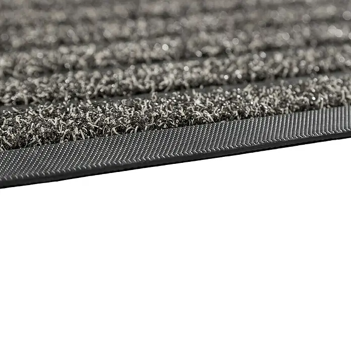 Astra Fußmatte Scraper Line - Anthrazit/Schwarz, 40 x 60 cm - Nahaufnahme einer grauen Fußmatte mit strukturierten Rillen und robustem Rand für den Innenbereich. Schmutzabweisend und langlebig.