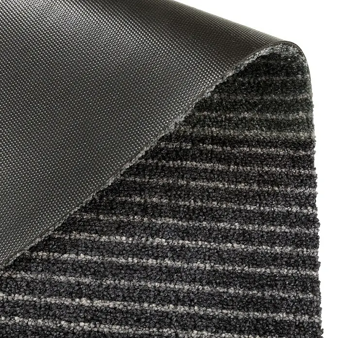 SCHÖNER WOHNEN-Kollektion Fußmatte Streifen - Anthrazit/Grau, 100 x 67 cm - Nahaufnahme einer anthrazitfarbenen Fußmatte mit Streifenmuster und rutschfester Unterseite für den Innenbereich.