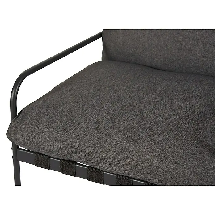 Conjunto de muebles Theodor - 4 pzs., Acero/Poliéster, Antracita - Detalle de un sillón gris con estructura metálica y asiento acolchado, ideal para interiores y exteriores.