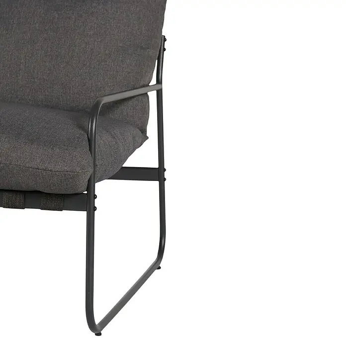 Conjunto de muebles Theodor - 4 pzs., Acero/Poliéster, Antracita - Primer plano de un sillón gris con estructura metálica, combinando diseño moderno y confort para espacios de vida elegantes.