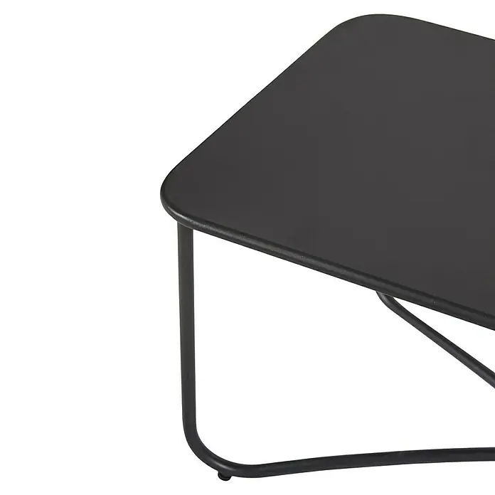 Conjunto de muebles Theodor - 4 pzs., Acero/Poliéster, Antracita - Primer plano de una mesa negra con esquinas redondeadas y una estructura de metal sencilla. La mesa luce moderna y minimalista.