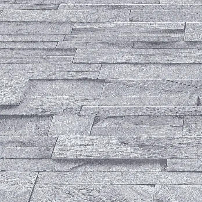 Papel pintado Piedra - Gris, Efecto piedra, 10 x 0,53 m - Primer plano de una pared texturizada con paneles de piedra gris, que ofrece un diseño moderno y elegante para interiores.