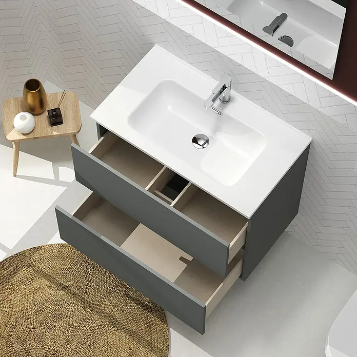 Artysan Conjunto de mueble de baño Harmony - Ancho: 80 cm, Gris oscuro, 3 pzs. - Toma de ángulo alto de un tocador de baño moderno con un lavabo y dos cajones abiertos.