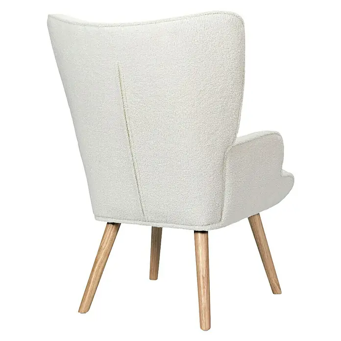 Home Deco Factory Sillón Rhea - L x An x Al: 75 x 68 x 96 cm, Blanco, Textil rizado - Primer plano de un sillón con tapicería de buclé color crema y patas de madera clara, que ofrece una estética moderna y acogedora.