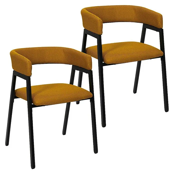 Home Deco Factory Silla Atom - Mostaza, 2 ud. - Dos sillas con tapicería de tela amarilla y estructura metálica negra sobre fondo negro.