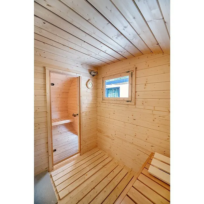 Tuindeco Saunahaus - L x B x H: 405 x 240 x 216 cm, Ohne Ofen - Holzsauna-Interieur mit hellen Holzpaneelen an Wänden, Decke und Boden, einschließlich einer Tür zum Saunabereich und einem kleinen Fenster.