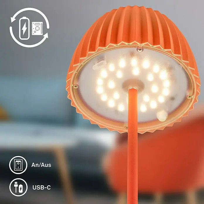 Brilo Riffle Akku-Tischleuchte - Ø x H: 14,3 x 36,4 cm, Orange, Warmweiß, 2 W, IP44, Classic - Nahaufnahme einer orangefarbenen LED-Tischleuchte mit wiederaufladbarem Akku und USB-C-Anschluss für bequemes Aufladen.