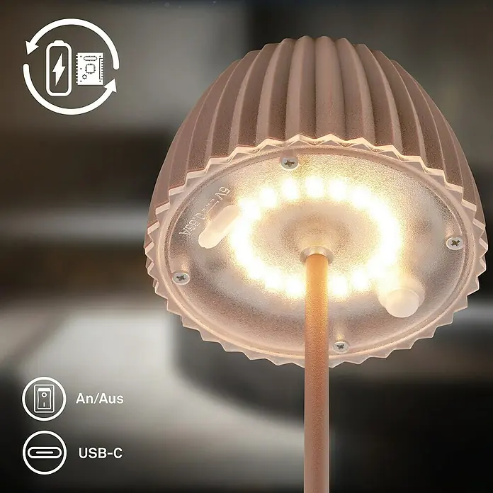 Brilo Riffle Akku-Tischleuchte - Ø x H: 8,5 x 20,1 cm, Braun, Warmweiß, 1,5 W, IP44, Mini - Nahaufnahme einer eleganten LED-Tischleuchte in Pilzform, die ein warmes, einladendes Licht ausstrahlt und moderne Technologie vereint.