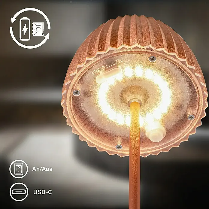 Brilo Riffle Akku-Tischleuchte - Ø x H: 8,5 x 20,1 cm, Kupfer, Warmweiß, 1,5 W, IP44, Mini - Nahaufnahme einer kupferfarbenen LED-Tischleuchte mit Akku, An/Aus-Schalter und USB-C-Anschluss für modernes Ambiente.