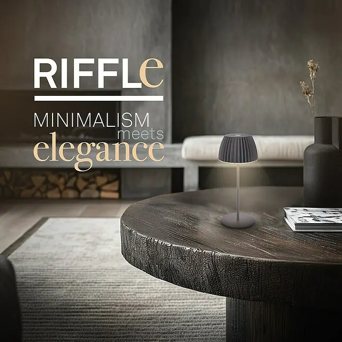 Brilo Riffle Akku-Tischleuchte - Ø x H: 8,5 x 20,1 cm, Anthrazit, Warmweiß, 1,5 W, IP44, Mini - Nahaufnahme einer stilvollen Riffle-Tischleuchte, die minimalistisches Design und Eleganz vereint, perfekt für moderne Innenräume.