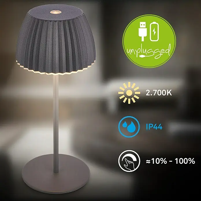 Brilo Riffle Akku-Tischleuchte - Ø x H: 8,5 x 20,1 cm, Anthrazit, Warmweiß, 1,5 W, IP44, Mini - Bild einer grauen Tischleuchte mit LED-Beleuchtung und Touch-Funktion. Die Leuchte ist kabellos und wiederaufladbar.