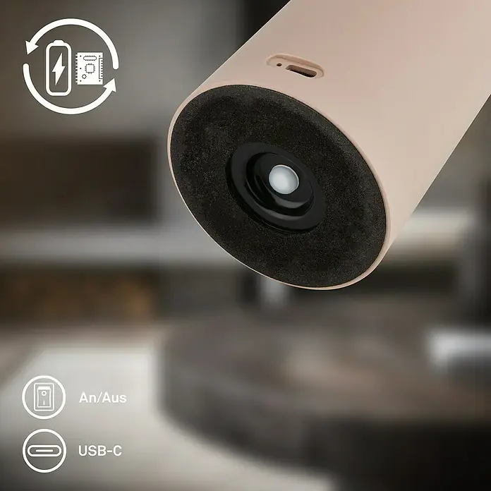 Brilo Akku-Tischleuchte Juna - Ø x H: 13 x 20,5 cm, Beige, Warmweiß, 1,8 W, IP44 - Nahaufnahme des unteren Endes eines kabellosen, beigen Staubsaugers mit schwarzer Basis und USB-C-Anschluss für einfaches Aufladen.