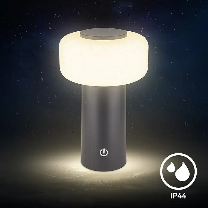 Brilo Akku-Tischleuchte Juna - Ø x H: 13 x 20,5 cm, Anthrazit, Warmweiß, 1,8 W, IP44 - Tischleuchte mit pilzförmigem Lampenschirm, die ein warmes Licht abgibt. Wasserdichtigkeitssymbol IP44 für den Gebrauch im Freien.