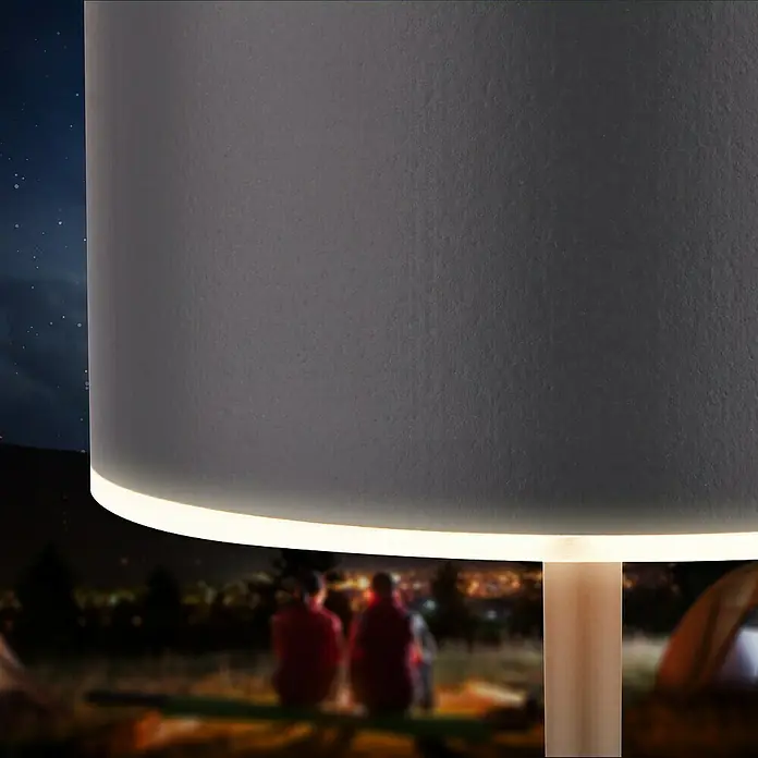 Brilo Akku-Tischleuchte Kira - Ø x H: 9 x 18 cm, Anthrazit, Warmweiß, 1,5 W, IP44 - Nahaufnahme einer modernen Lampe mit sanftem Lichtschein, ideal für gemütliche Abende.