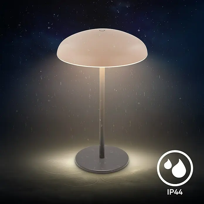 Brilo Akku-Tischleuchte Caxa - Ø x H: 19,5 x 30,5 cm, Beige, Warmweiß, 2,8 W, IP44 - Bild einer wetterfesten Stehlampe mit pilzförmigem Schirm, die ein warmes Licht ausstrahlt, mit Schutzart IP44.