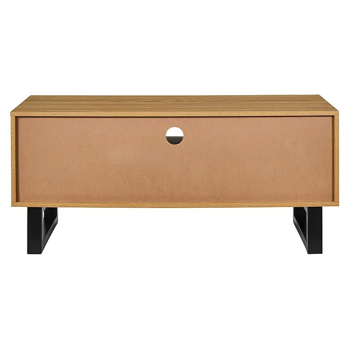 Home Deco Factory Calypso Mueble para TV - L x An x Al: 40 x 110 x 48 cm, Marrón/Negro, Relieves curvos - Vista posterior de un mueble de TV de madera clara con una abertura redonda para cables y una base de metal negro.