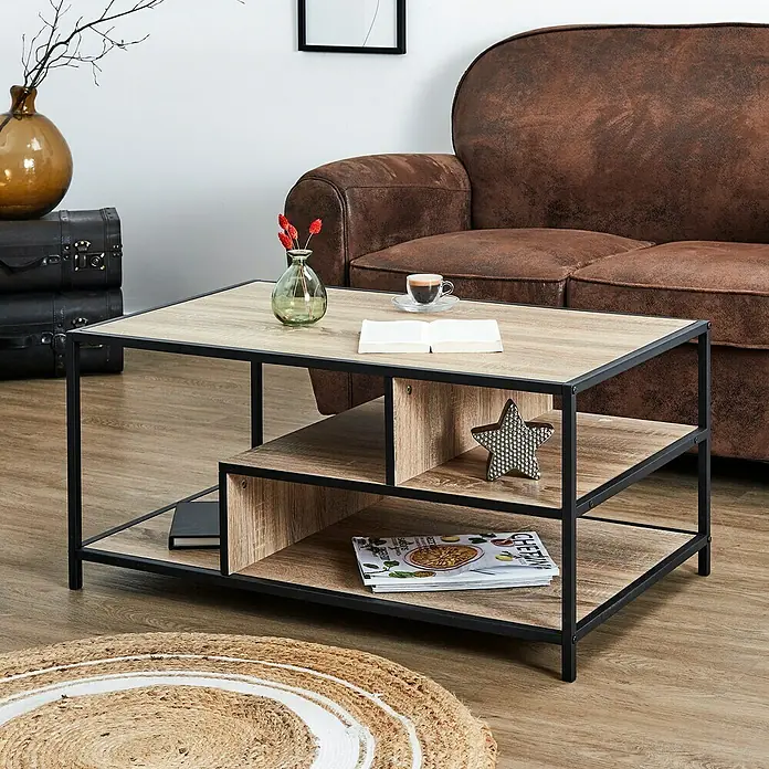 Home Deco Factory Edison Conjunto mueble de salón - 3 pzs., Negro/Marrón - Elegante imagen de una mesa de centro con una superficie de madera, patas metálicas negras y prácticas estanterías para guardar libros o decoraciones.