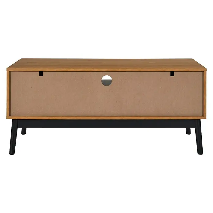 Home Deco Factory Felix Mueble para TV - L x An x Al: 40 x 110 x 48 cm, MDF, Acabado en espiga - Vista trasera de un armario de madera con orificio para la gestión de cables. El diseño proporciona una solución de almacenamiento elegante y práctica.