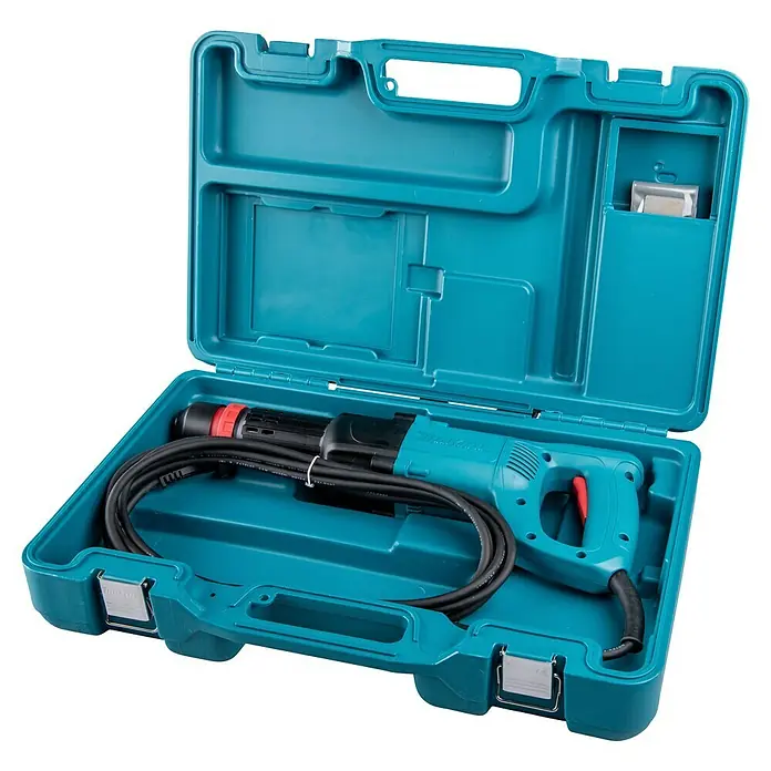 Makita Martillo combinado HK0500 - 550 W, 1,8 J, Alojamiento SDS-Plus - Un martillo demoledor turquesa Makita se encuentra en un maletín de herramientas de plástico turquesa a juego.