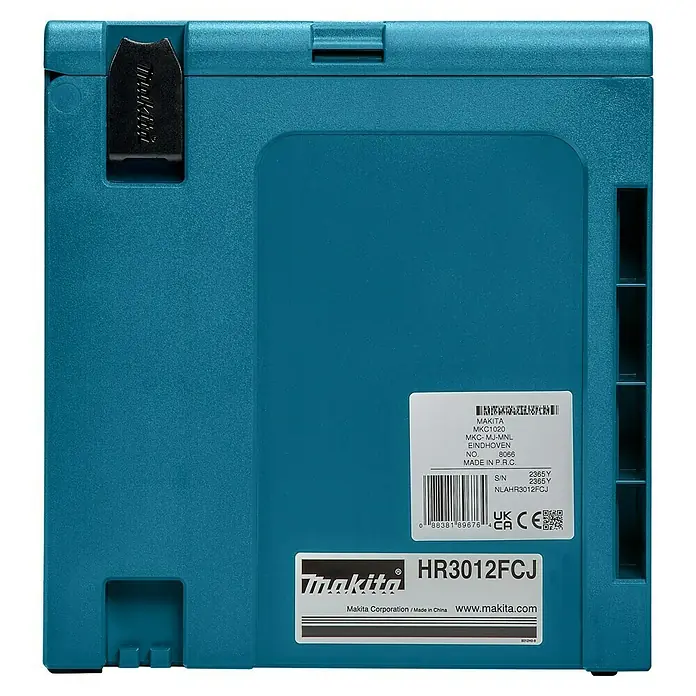 Makita Martillo combinado HR3012FCJ - 1.050 W, 3,9 J, Alojamiento SDS-Plus - La caja de herramientas azul Makita HR3012FCJ muestra adhesivos que detallan la información del modelo y los detalles de fabricación.