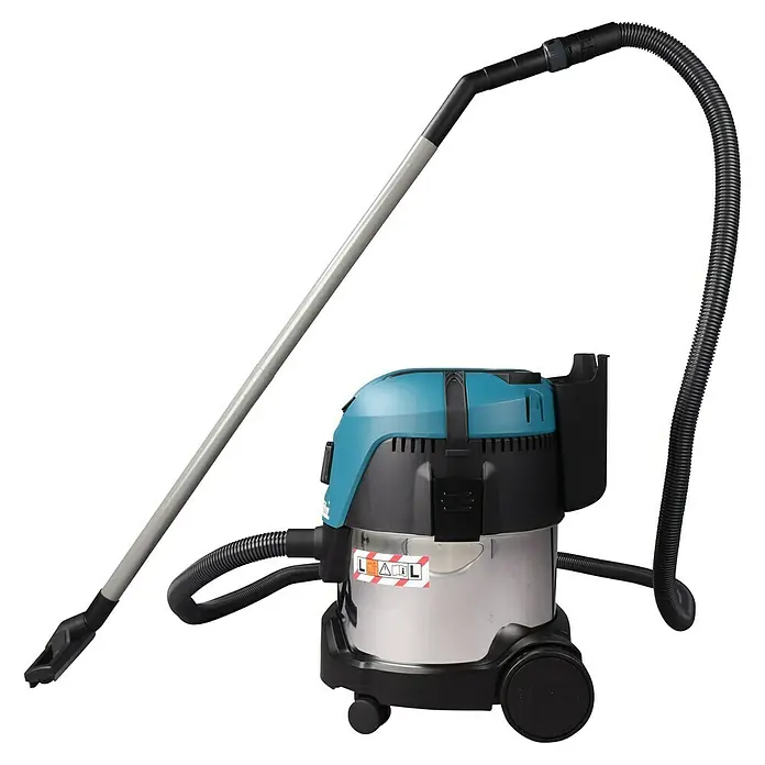 Makita Aspirador en seco y húmedo VC2012L - 1.000 W, 20 l - Imagen de un aspirador de sólidos y líquidos Makita con accesorios, ideal para obras y talleres.