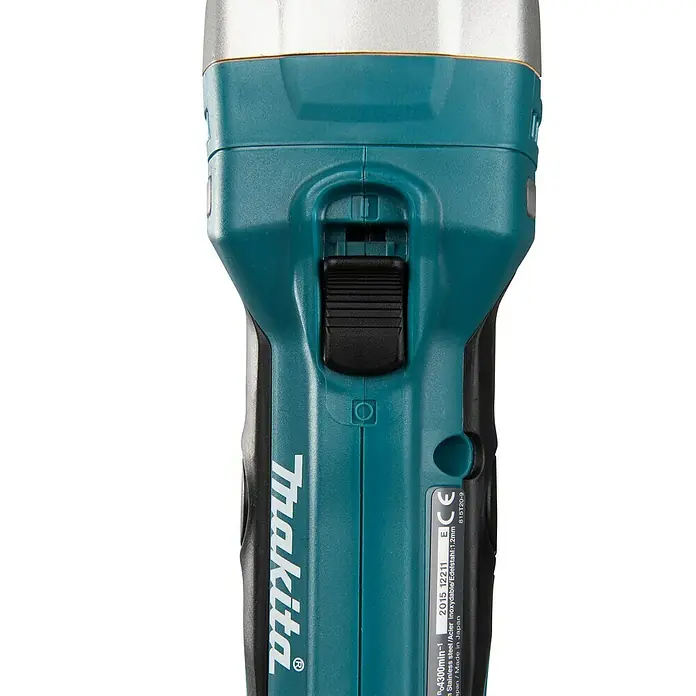 Makita LXT 18V Akku-Blechschere DJS161Z - 18 V, Ohne Akku, Leerlaufhubzahl: 4.300 /min - Nahaufnahme einer Makita Elektrowerkzeugmaschine mit blaugrünem Gehäuse und schwarzem Schalter.