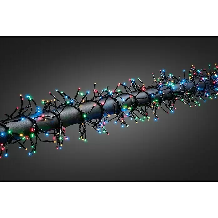 Konstsmide LED-Lichterkette Micro LED Cluster - Außen, Lichtfarbe: Mehrfarbig, Anzahl Leuchtmittel: 960 Stk. - Mehrfarbige LED-Lichterkette mit Sternenlichteffekt um ein dunkles Rohr gewickelt.