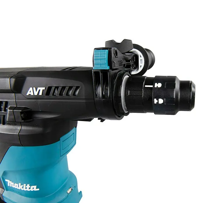 Makita Kombihammer HR3012FCJ - 1.050 W, 3,9 J, SDS-Plus-Aufnahme - Nahaufnahme einer Makita Abbruchhammer-Maschine, die Details des Designs und der Bauweise hervorhebt.