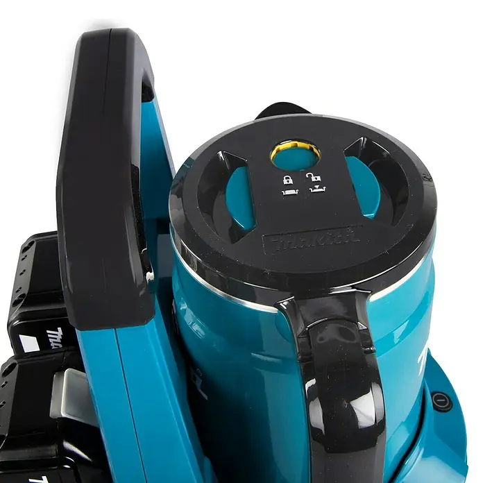 Makita LXT 18V Wasserkocher Akku DKT360Z - 18 V, Ohne Akku - Nahaufnahme eines Makita-Staubsaugers in Türkis und Schwarz, der ein kompaktes und tragbares Design für Reinigungsarbeiten zeigt.