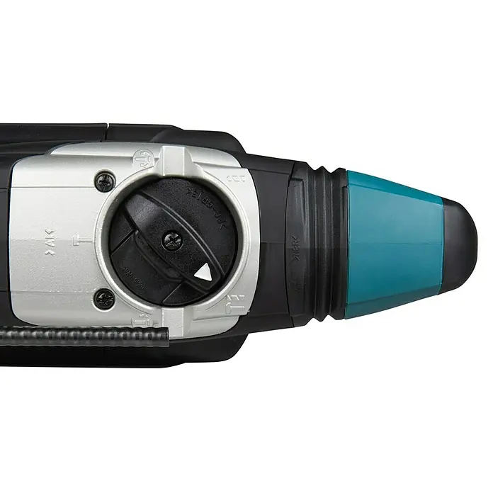 Makita Kombihammer HR3210FCT - 850 W, 4,9 J, SDS-Plus-Aufnahme - Nahaufnahme einer Makita-Bohrmaschine, die Details des Bohrfutters und der Wahlschalter hervorhebt.
