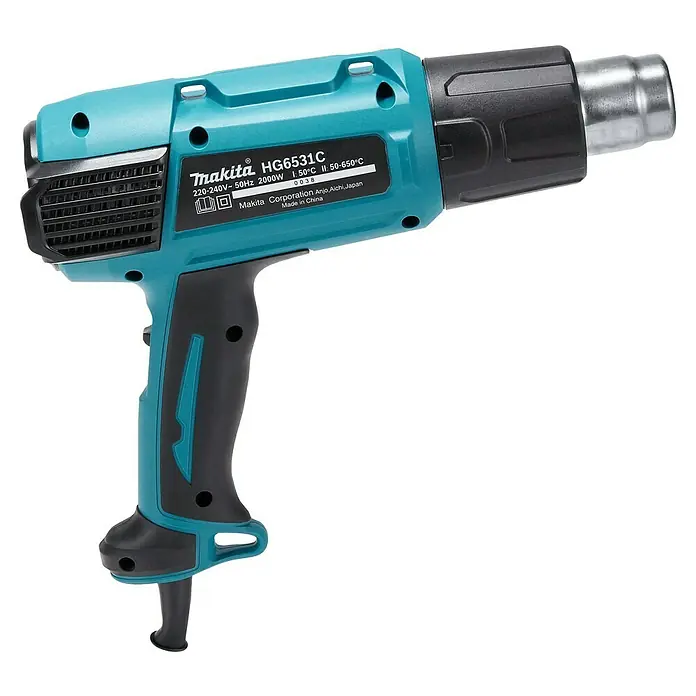 Makita Pistola de aire caliente HG6531C - 2.000 W, Rango de temperaturas: 50 °C - 650 °C - Imagen de una pistola de calor Makita HG6531C turquesa y negra.