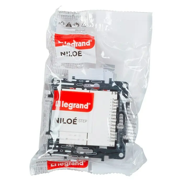 Legrand Niloé Step Conmutador doble - Blanco, Instalar, Plástico - Un interruptor de dos vías Legrand Niloe Step empaquetado, ideal para instalaciones eléctricas y proyectos de bricolaje.