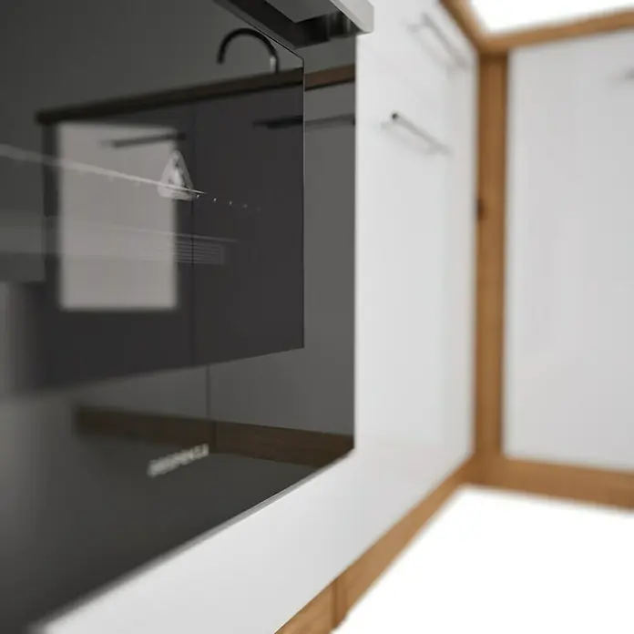 Respekta Cocina esquinera Hilde - Ancho: 250 cm, Blanco, Mate, Efecto madera, Con electrodomésticos - Primer plano de un horno negro y elegante en una cocina moderna, mostrando su diseño.