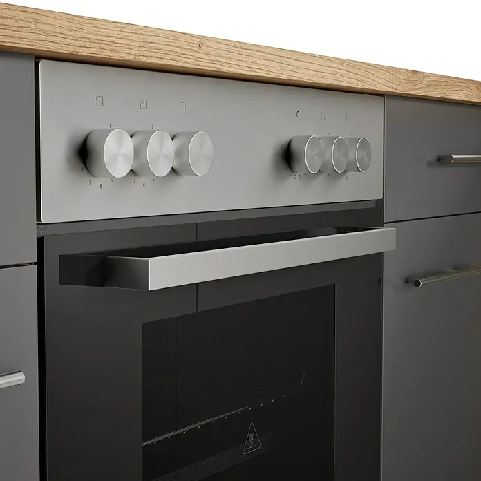 Respekta Cocina esquinera Hilde - Ancho: 310 cm, Gris, Efecto madera, Con electrodomésticos - Primer plano de un horno gris moderno con botones y asa plateados, empotrado en un mueble de cocina con una encimera de madera.