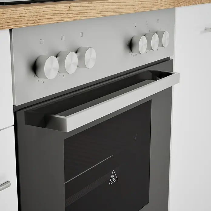 Respekta Composición de cocina Hilde - Ancho: 280 cm, Blanco, Con electrodomésticos - Primer plano de un horno moderno con pomos integrados en una cocina americana luminosa.