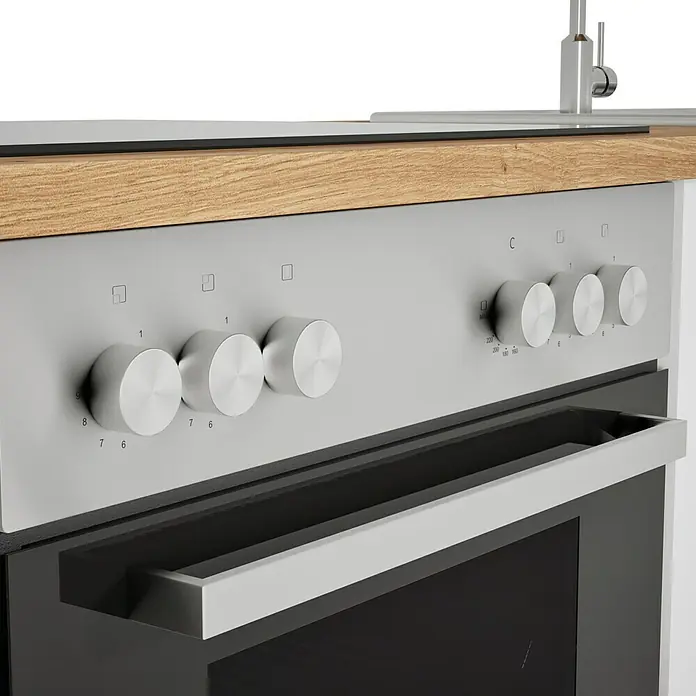 Respekta Cocina compacta Hilde - Ancho: 220 cm, Blanco, Se pueden montar de forma intercambiable, Con electrodomésticos - Primer plano de un horno plateado moderno con mandos giratorios y asa bajo una encimera de madera.