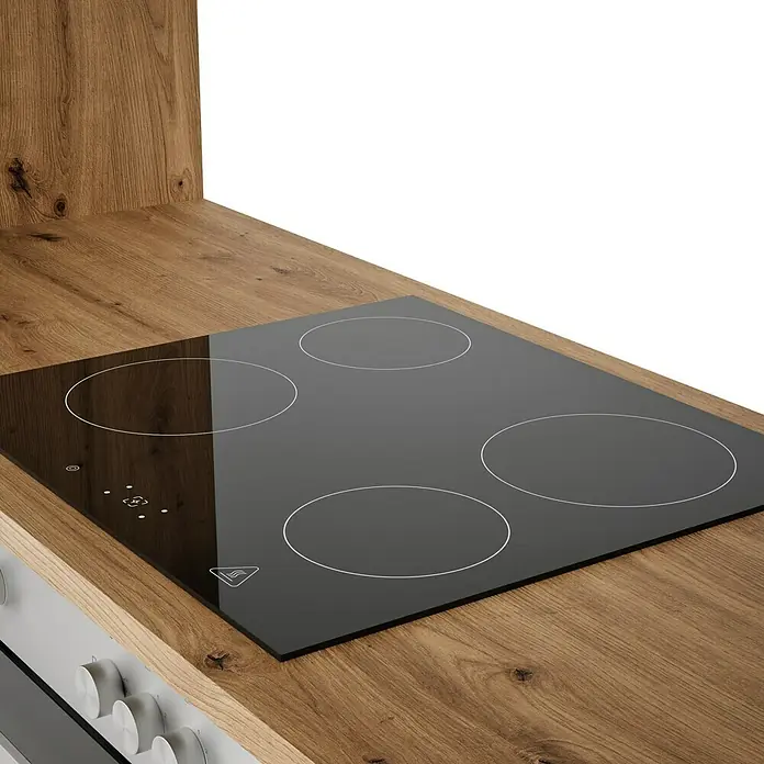 Respekta Composición de cocina Hilde - Ancho: 310 cm, Gris, Con electrodomésticos - Primer plano de una placa de inducción negra con cuatro zonas de cocción sobre una encimera de madera.